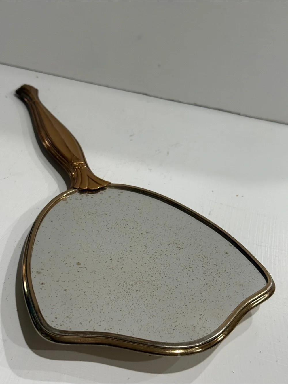 Mid Century Hollywood Regency Hand Held Mirror with Floral Detail 1950’s